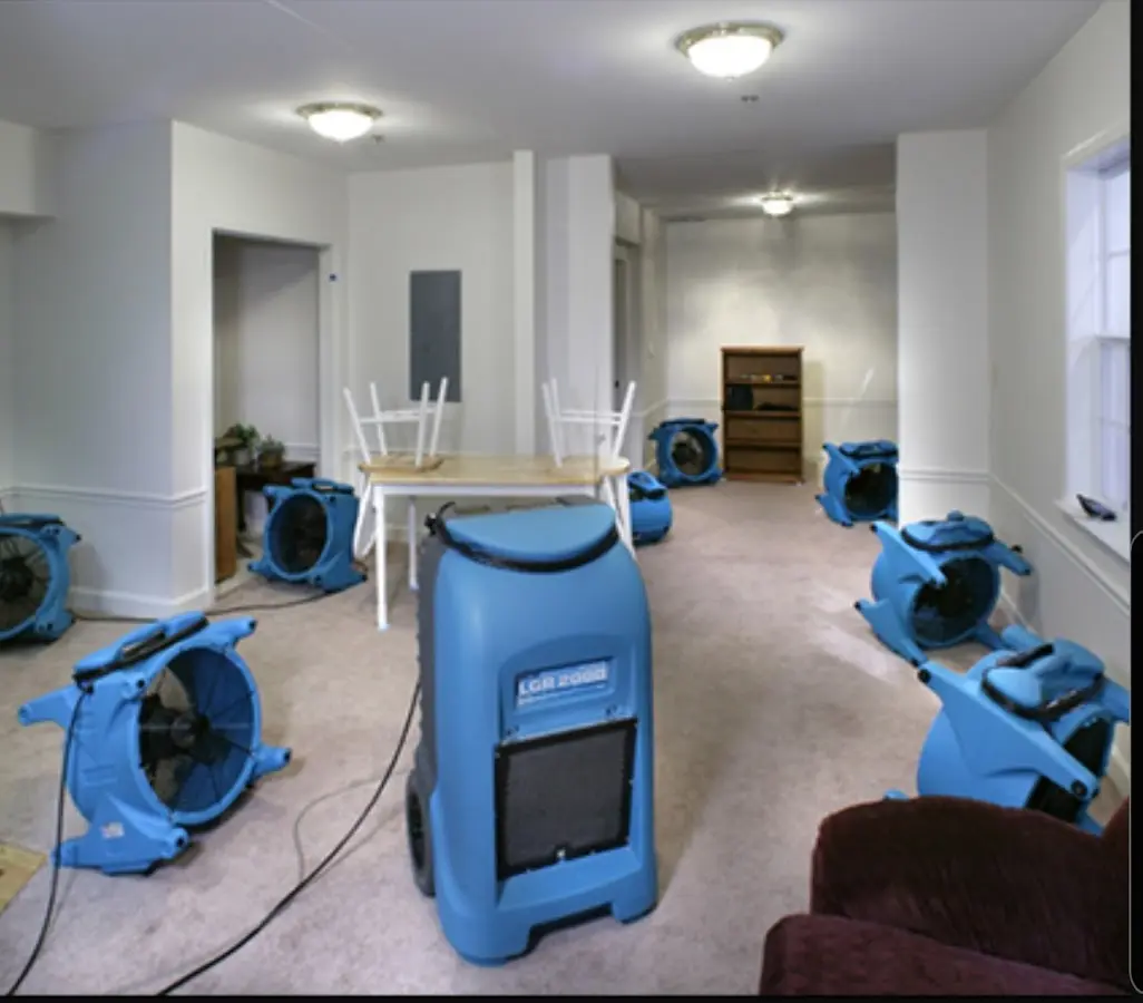 Air movers and dehumidifier setup for Water Extraction & Removal in Nellis AFB